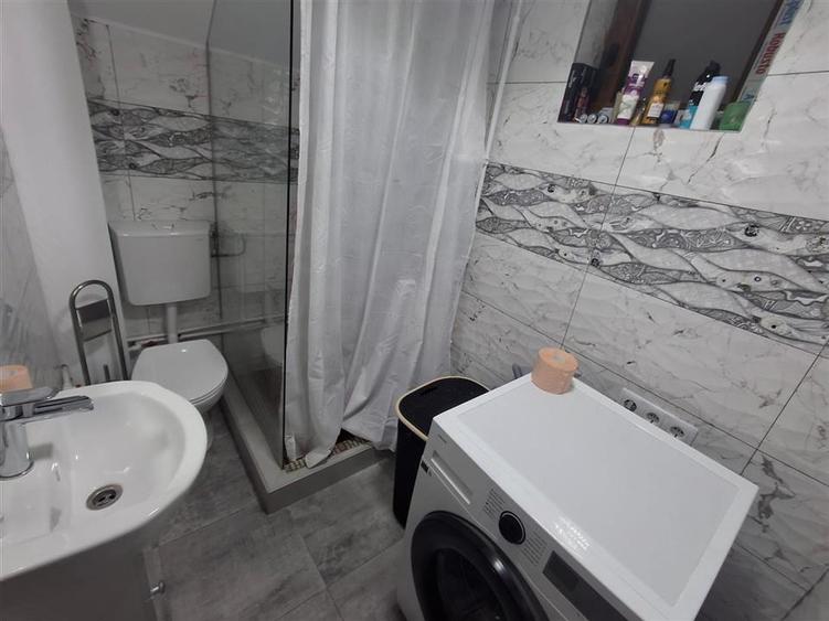 Casa individuala 3 camere 2 bai curte si garaj - zona Talmaciu