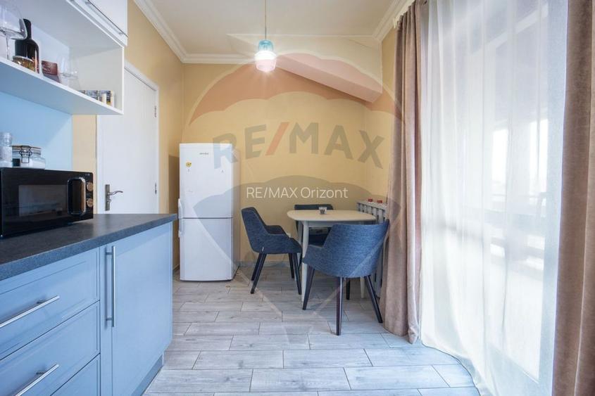 Apartament modern - investitie 375E/chirie - 4