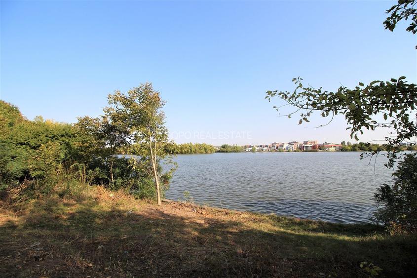 Teren 5963 mp deschidere lac Grivita 42 m cu deschidere la strazi 77 m - 5