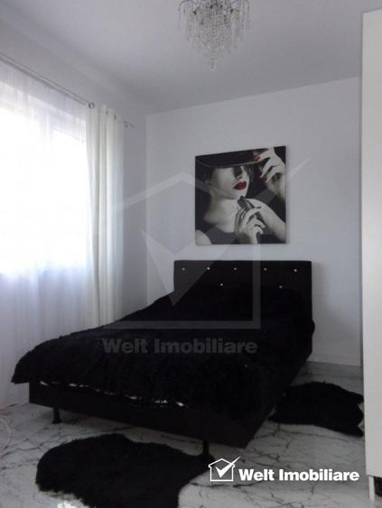 Casa individuala finisata P+E, 4 dormitoare,3 parcari intrare Chinteni
