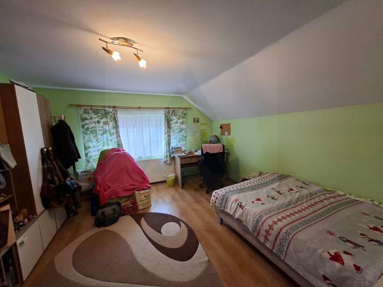 Casa cu etaj 113 mp utili curte libera 350mp garaj cu pod Gusterita