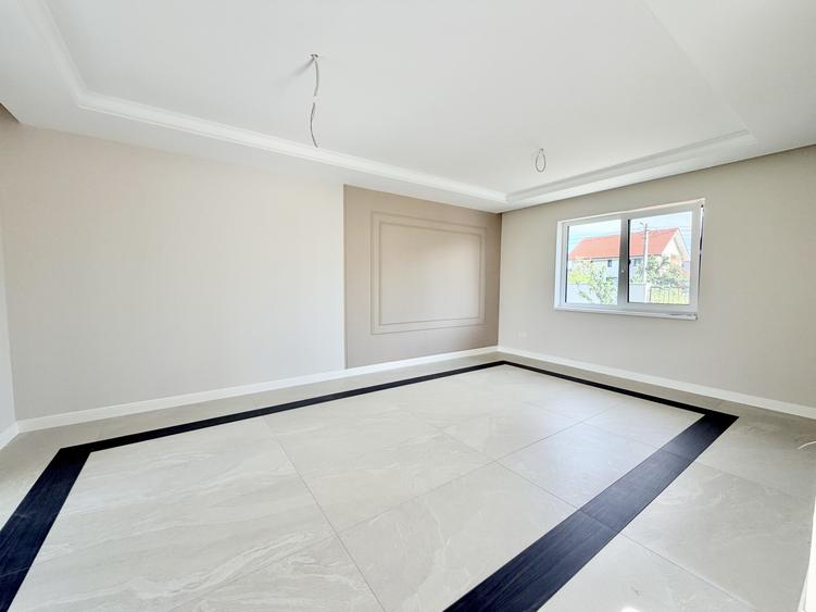 Casa individuala deosebita - 520 mp teren - curte amenajata