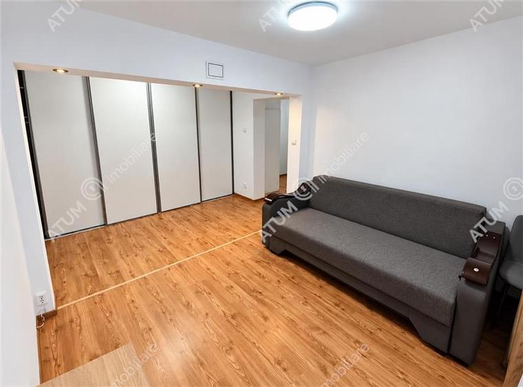 Apartament renovat cu 3 camere 2 bai si pivnita in Sibiu