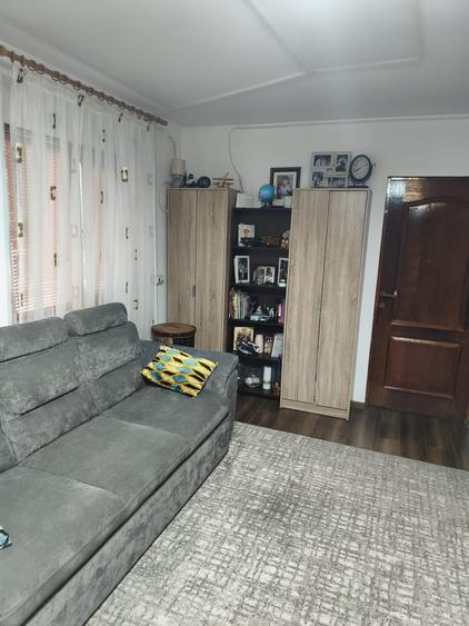 Casa pe care o doresti , nu foarte mare si confortabila , livada cu pomi pe rod