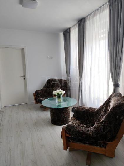 Apartament 2 camere, Chinteni – finisat, terasă 22 mp, parcare inclusă
