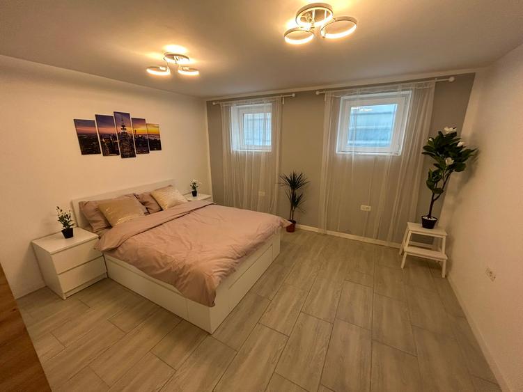 Dacia - Eminescu - Apartament 3 camere demisol/2 etaje - renovat-centrala termic