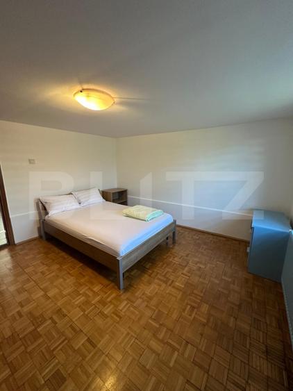 Două apartamente la casă, teren 250 mp, grădină, garaj, parcare proprie