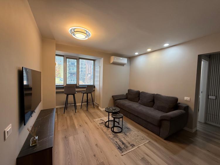 Vanzare 2 camere Magheru - Universitate, renovat, mobiliat
