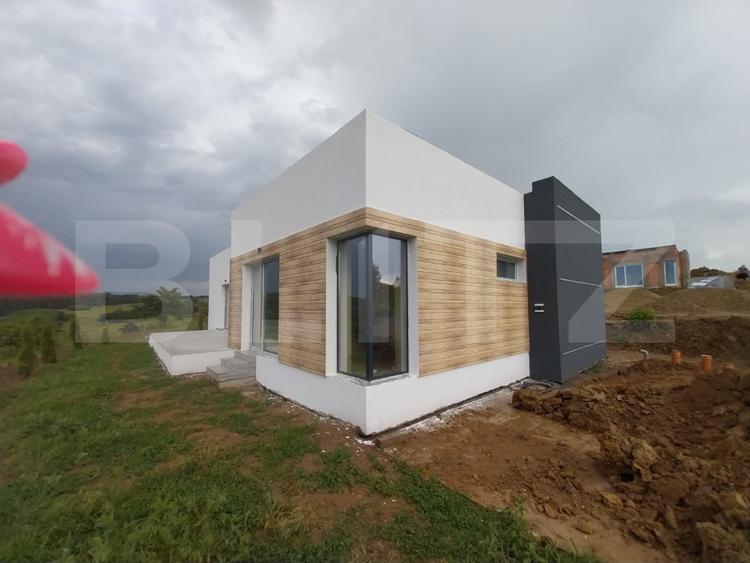 Casă nouă mediteraneană, 3 camere, 105 mp utili, teren 630 mp, drum privat