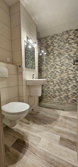 Inchiriez apartament de 3 camere situat central-G-ral Magheru, etaj 1