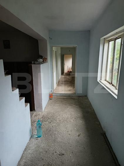 Casa renovabila,  cu un teren 2000 m,  intr-o zona linistita!