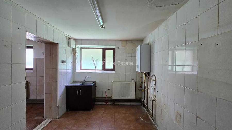 Strada Mircea cel Batran - Casa demisol (58mp)+parter (69mp) /teren 150 mp - 16