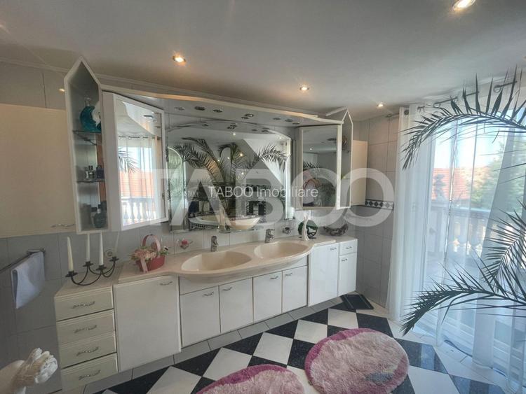 Casa deosebita  de vanzare 453 mp utili si curte 528 mp in Avrig - 9