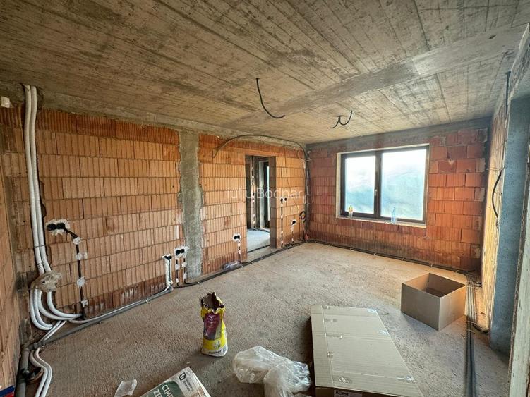 Casa P + 1 , 4 camere, 2 bai, bucatarie cu dining - 13