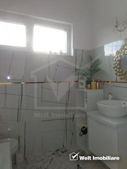 Casa individuala finisata P+E, 4 dormitoare,3 parcari intrare Chinteni