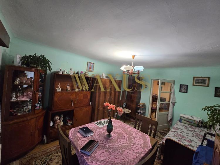 Casa de vanzare cu 2 camere si curte generoasa in zona Gruia