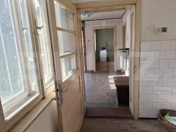 Vânzare Casă în Săcele - Locuință cu Teren Generos cu Potențial -de Renovat