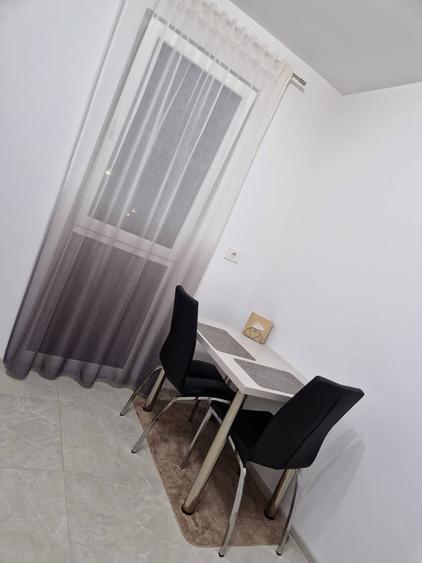 Apartament în bloc nou, cu parcare subterană.