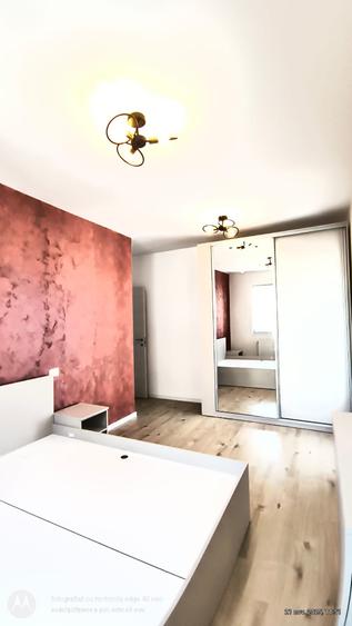 Apartament cu 3 camere, 2 bai si loc de parcare
