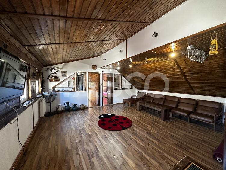 Casa individuala de vanzare acces auto in curte pe malul Cibinului
