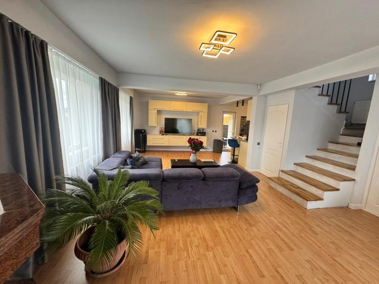 Casă modernă complet renovată, cu curte amenajată și sisteme inteligente