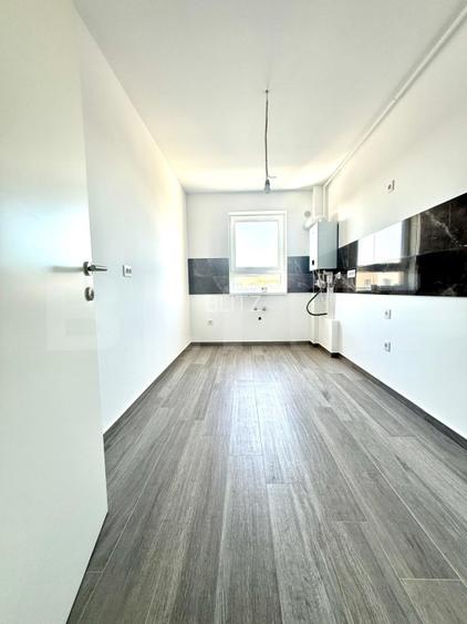 Apartament cu 2 camere decomandat, etaj 10/10 - Tractorul - 12