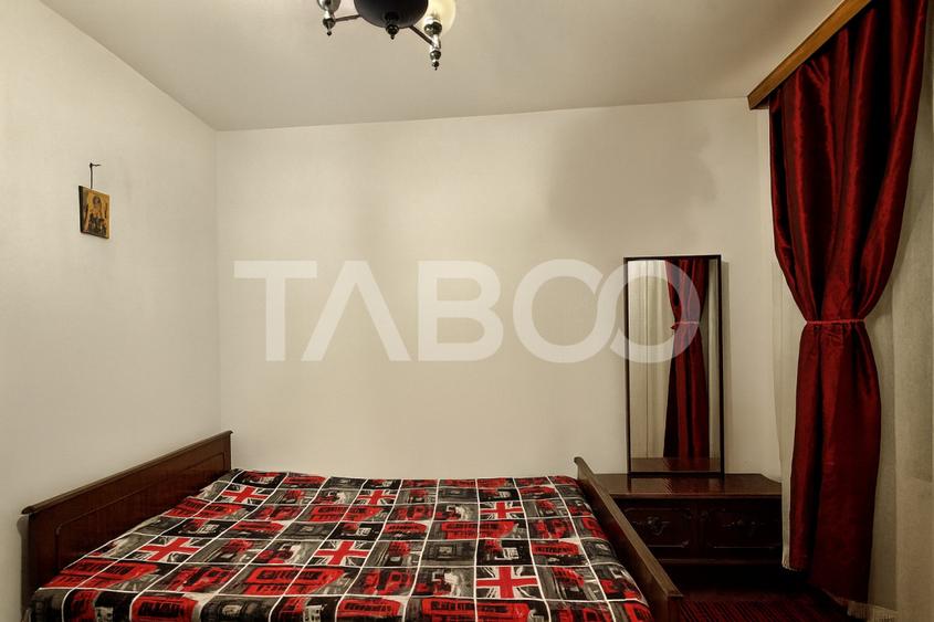 Apartament etaj 1 de vanzare 3 camere 2 bai balcon pivnita Cisnadie