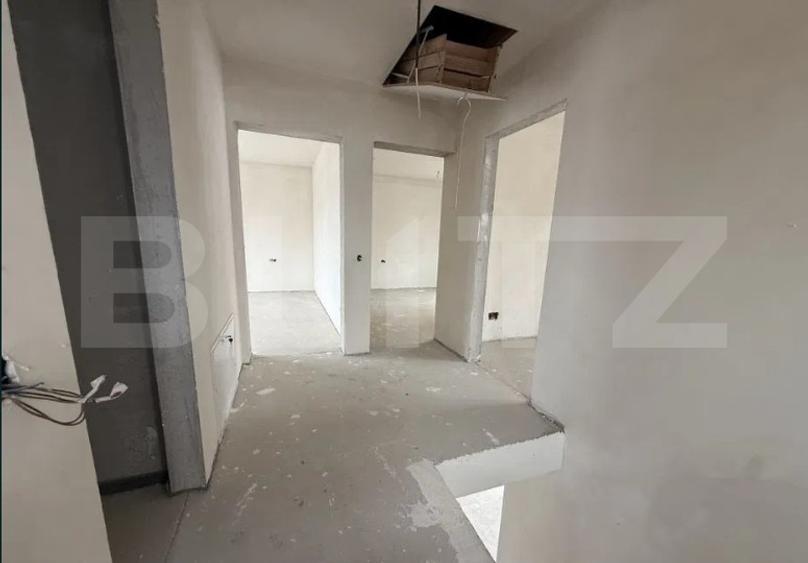 Casă individuală în Chinteni, 120 mp utili, teren de 500 mp, garaj
