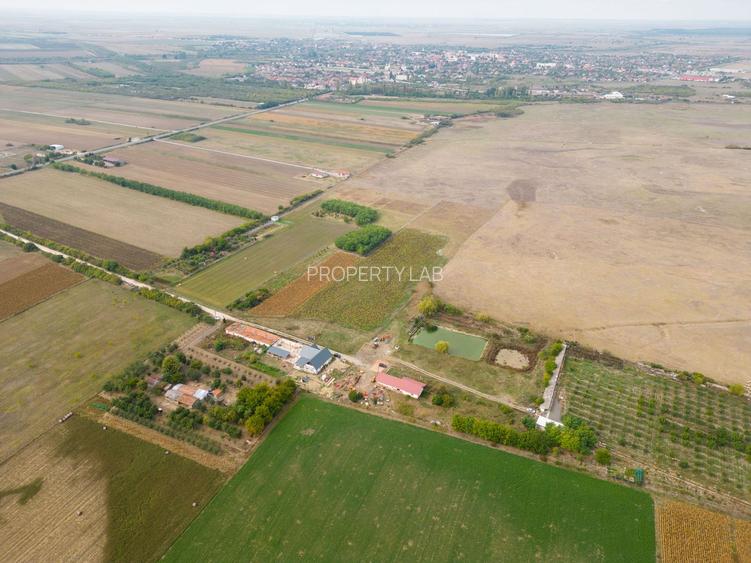 Casă cu teren 13 418 mp intravilan