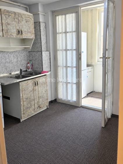 Apartament cu 2 camere de vanzare in Centru | 57 mp utli | Decomandat | Etaj 1 .