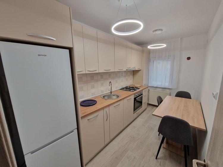 Apartament 2 camere Racadau-intrare,mobilat-utilat,modern,128000 Euro