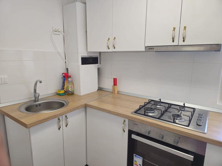 Casa finisata la curte comuna, 56 mp, 2 camere - zona Centrala