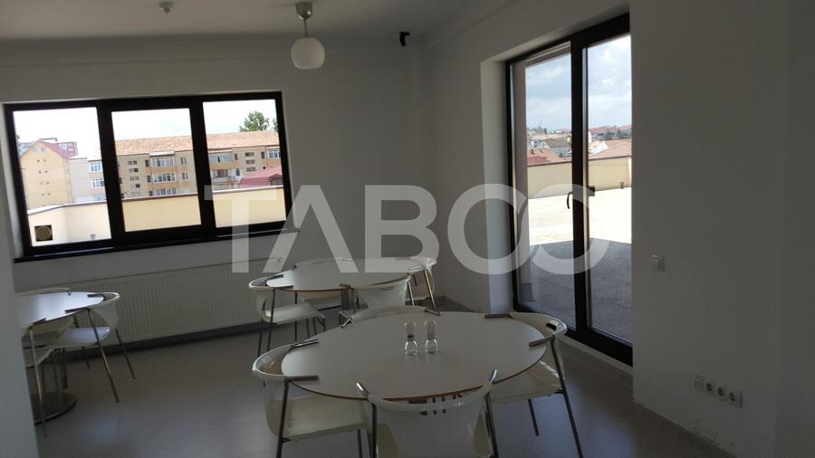 Cladire moderna cu teren 890 mp P+2E+ET birouri si spatiu comercial