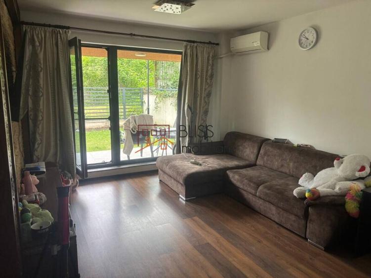 Apartament cu grădină generoasă și parcare