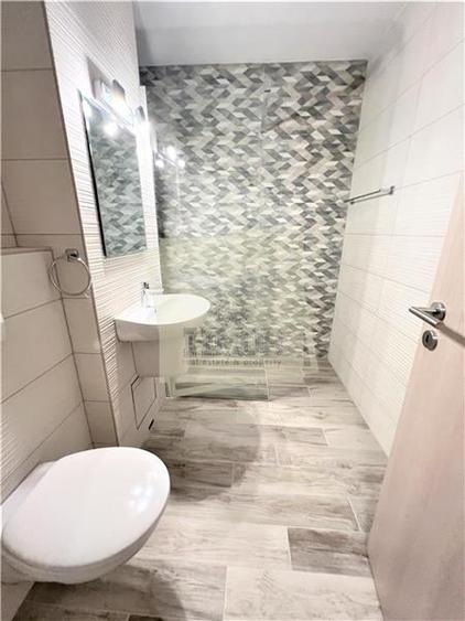 Apartament etajul 1 cu 3 camere 2 bai 2 balcoane zona centrala