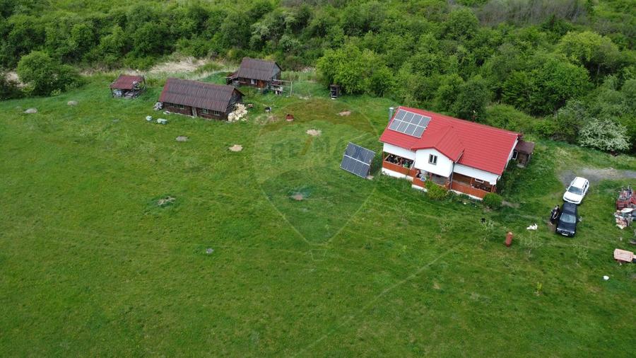 Proprietate OFF-GRID 5,76 Ha. Casa tradiționala lemn. Limită Cluj