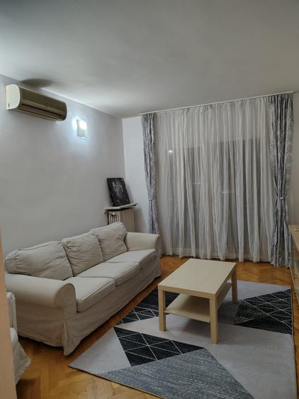 Închiriere Apartament 3 camere în Unirii, Piata NATIUNILE UNITE, SEMIDECOMANDAT