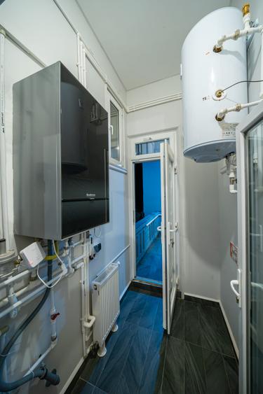 Apartament 4 camere, in conditii excelente, situat la parter.