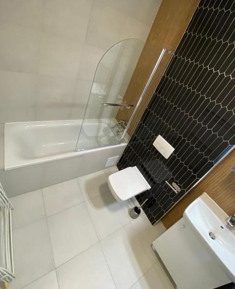 Apartament modern cu 2 camere pereți retractabili terasă parcare și boxă