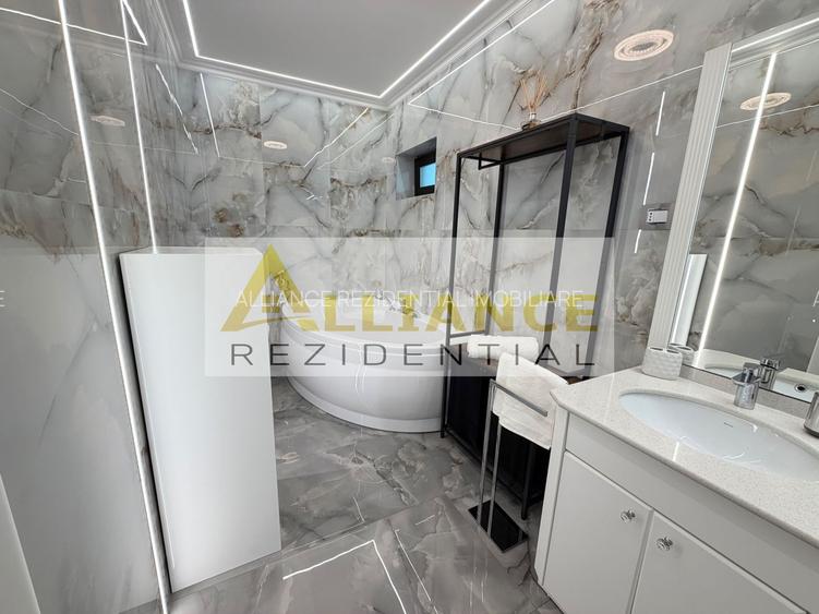 Casa P+1+M cu teren de 650 mp, piscina si curte complet amenajata