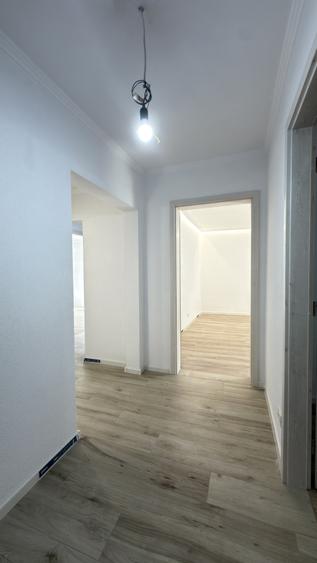 Apartament 3 camere, 2 bai, etaj 1 decomandat, 65 mp utili - Dambovita