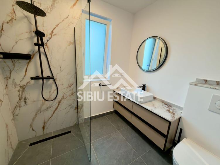 Apartament central finisare premium parcare subterana imobil nou