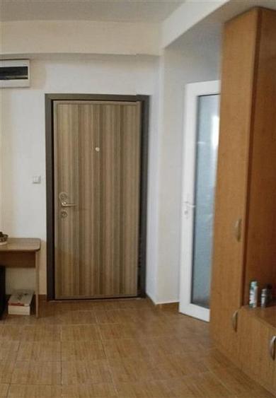 Decomandat cu 2 bai cu loc de parcare inclus