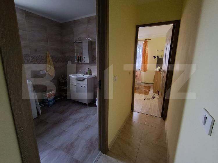 Casa cu 3 camere,baie, bucatarie, teren 500 mp