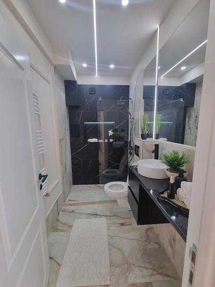 Apartament cu 2 camere,ultrafinisat ,zona centrală
