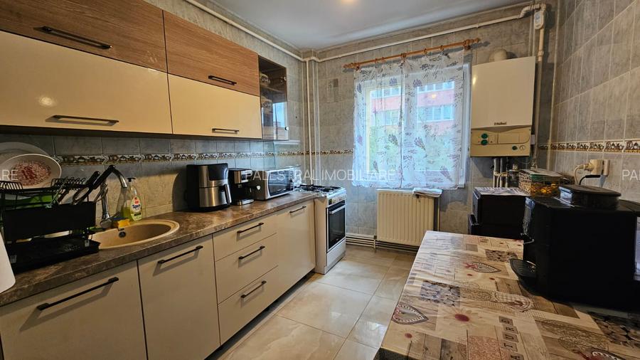 Apartament 2 camere Racadau,etajul 1,decomandat,127000 Euro - 2