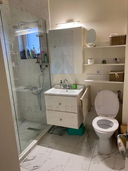 Apartament cu 3 camere 2 bai si curte individuala 74 mp în Șelimbăr