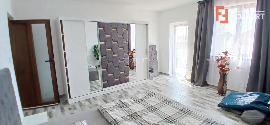 Casa individuala cu 6 camere Parter + 1 Etaj in Comlosu Mare - 23