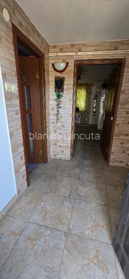 Proprietate deosebită în Buftea – casă P+1, teren 3.500 mp, magazin închiriat, l - 11