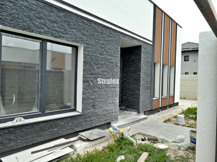 Casa individuala  cu 4 camere si 2 bai
